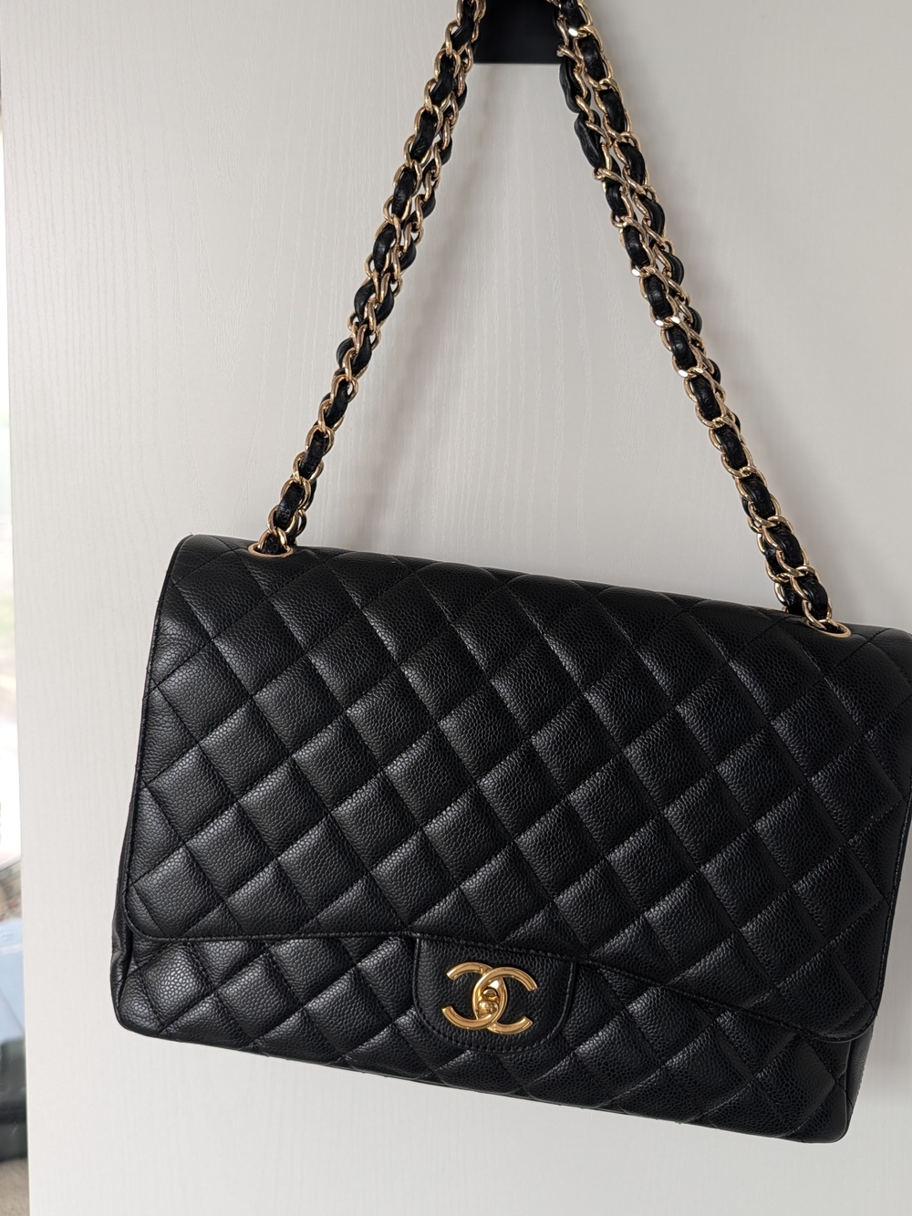 Chanel Maxi Classic Flap Bag in Black Cavier with Gold Hardware